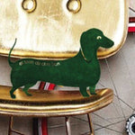 Escultura, aventurero salchicha verde